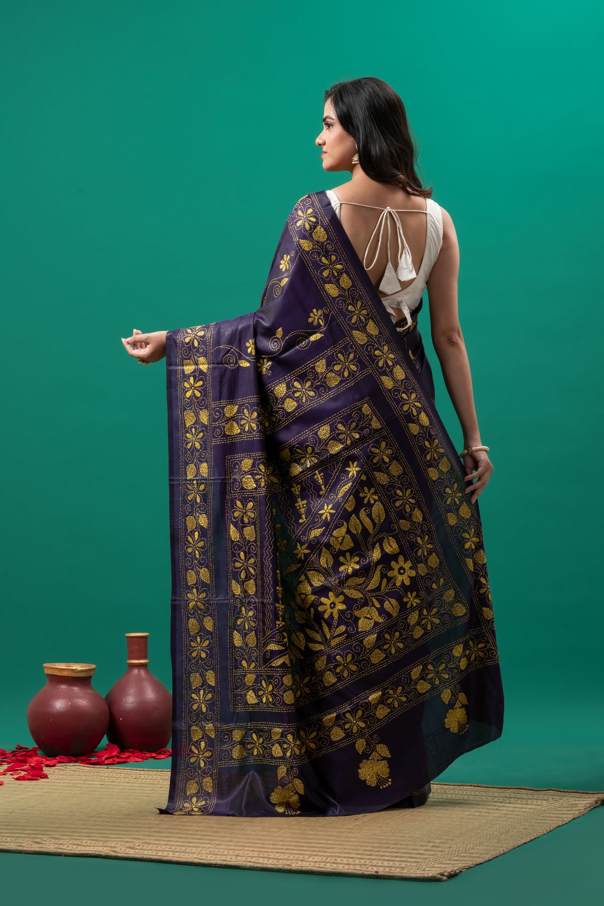 Purple kantha stitch saree and yellow flower motif