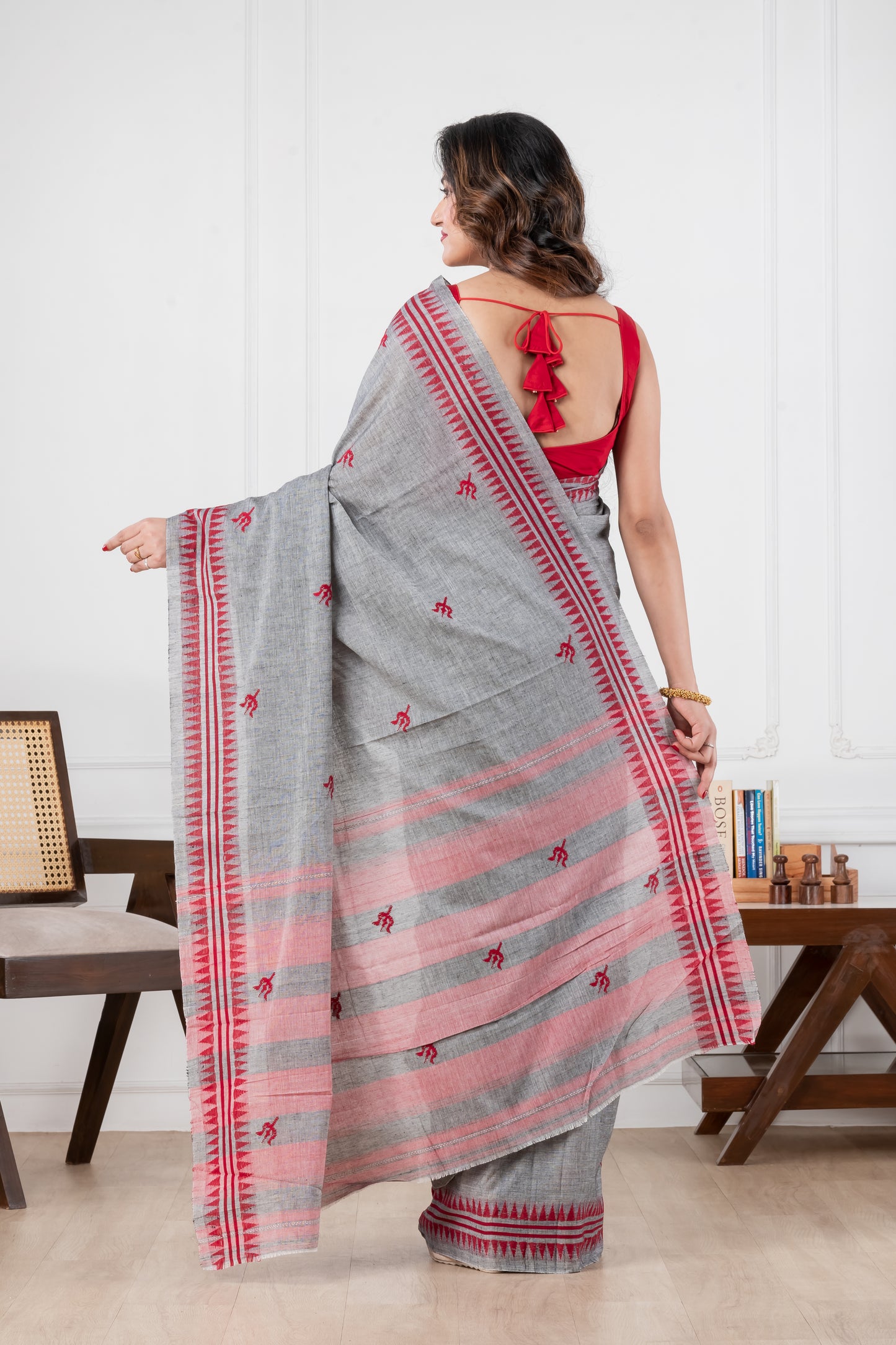 Woman wearing a gray saree