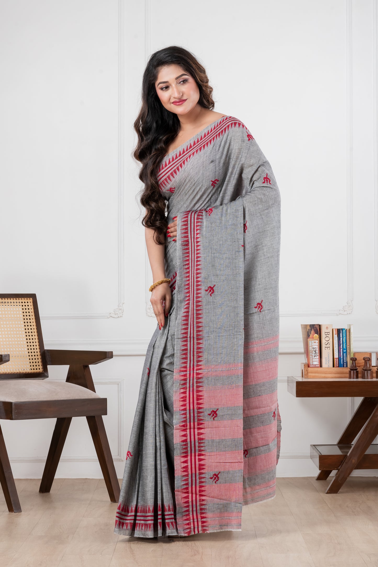 Woman wearing a gray saree