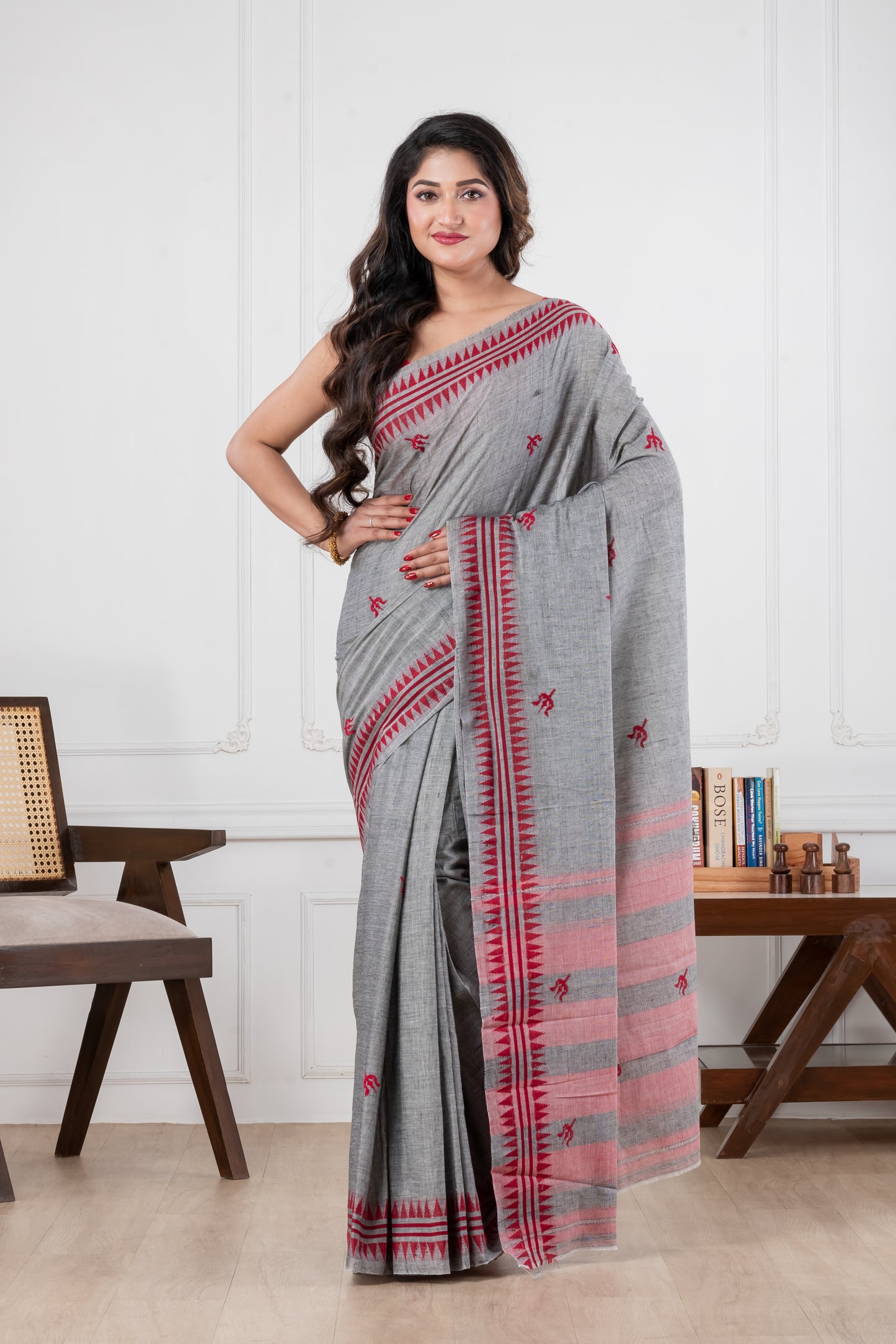 Woman wearing a gray saree