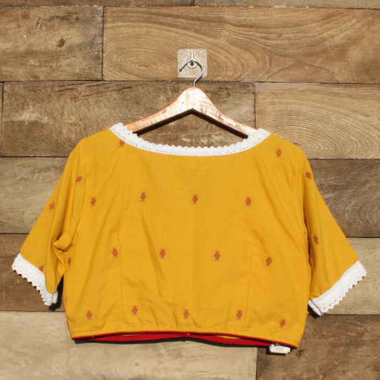 Yellow  jamdani  blouse with white lace trim