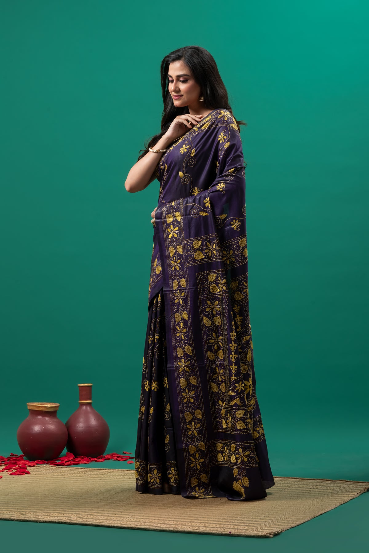 Purple kantha stitch saree and yellow flower motif