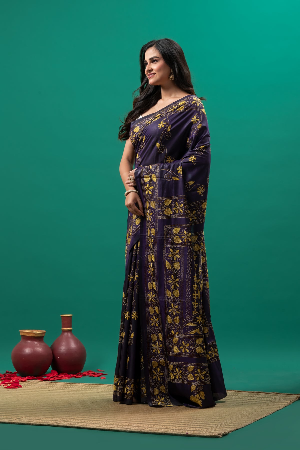 Purple kantha stitch saree and yellow flower motif