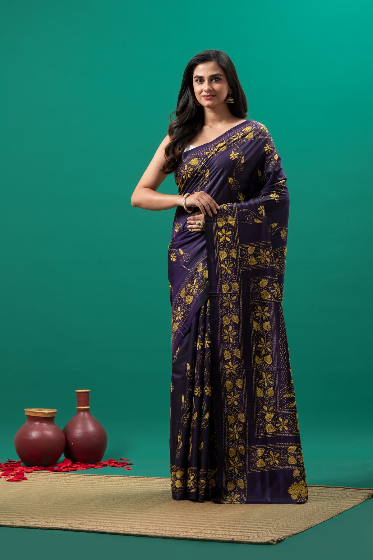 Purple kantha stitch saree and yellow flower motif