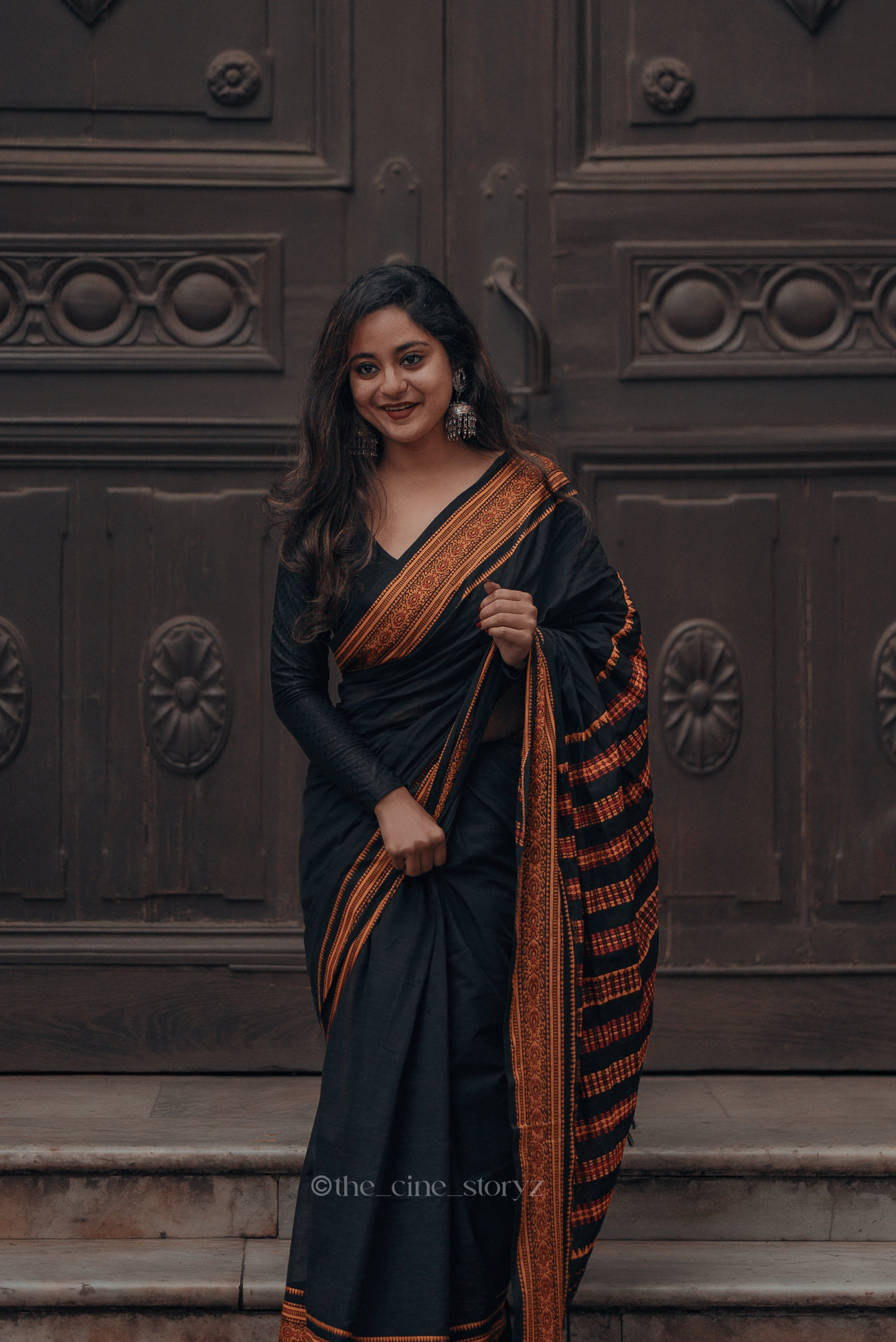 Pakhna Black and orange Begumpuri Saree