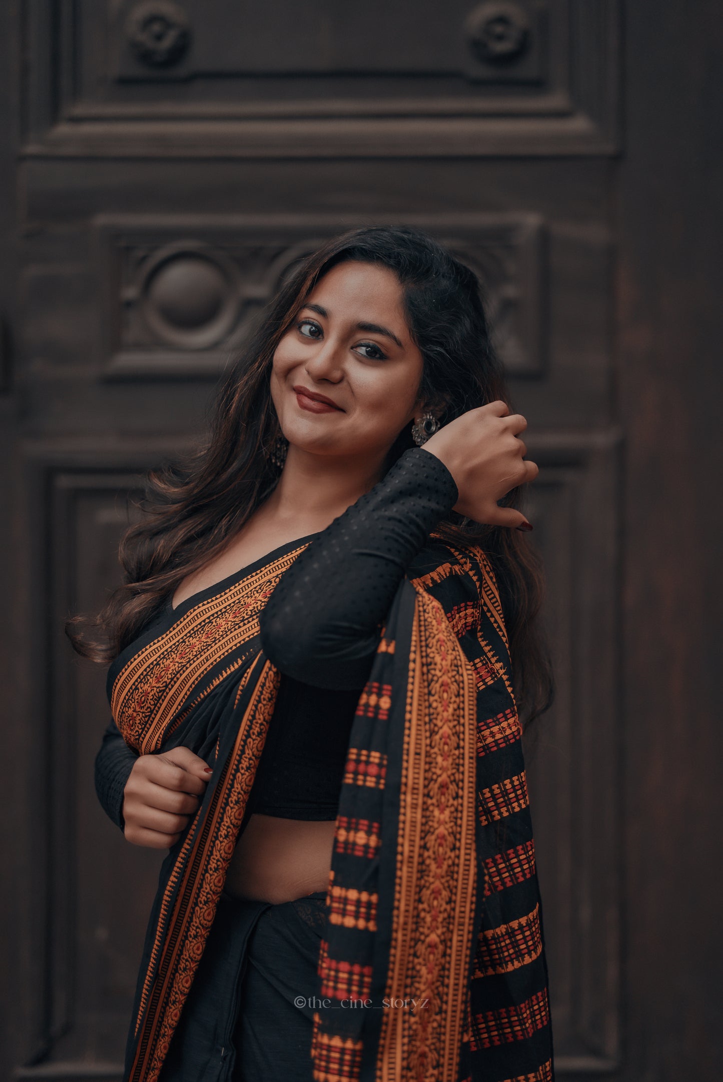 Pakhna Black and orange Begumpuri Saree