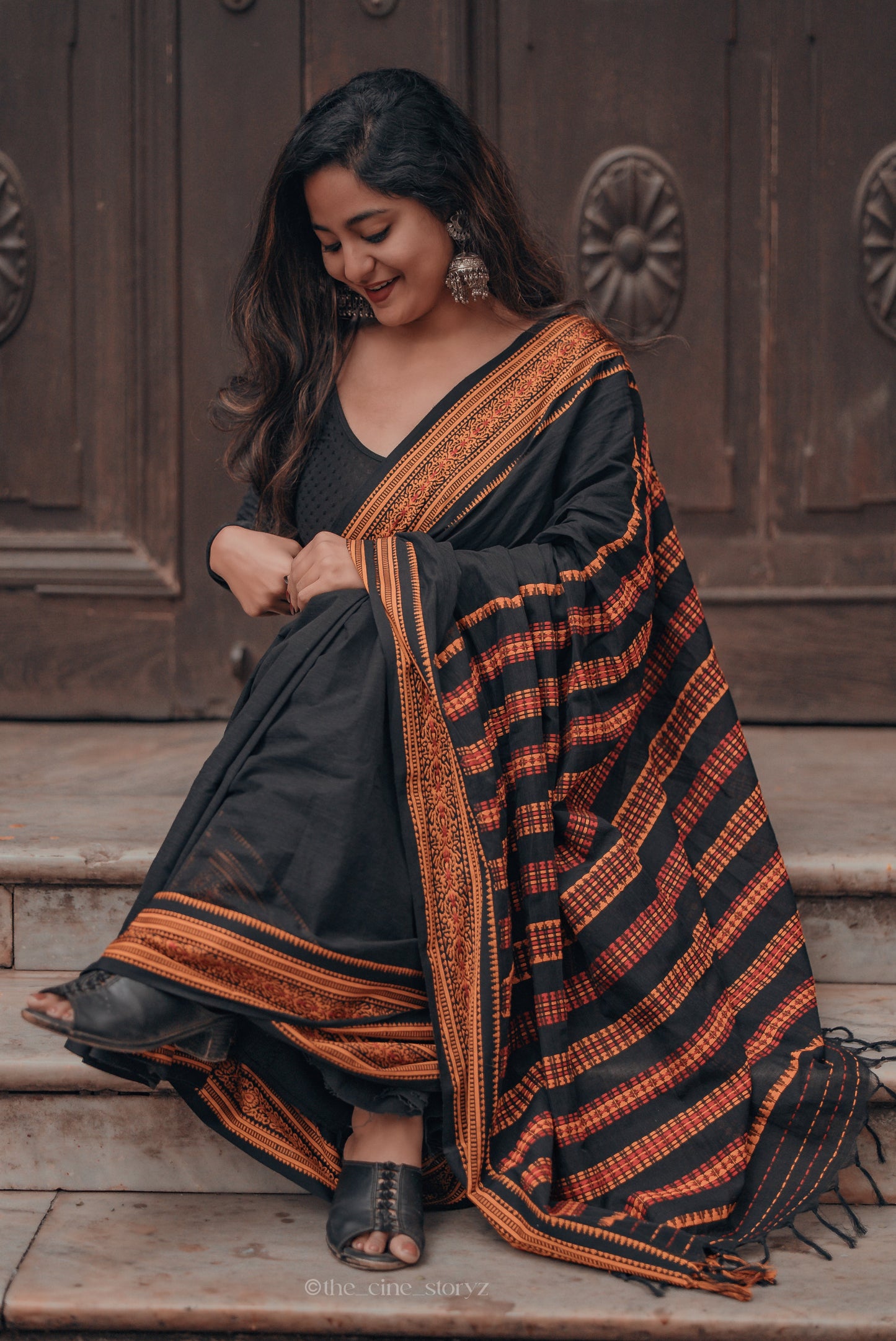 Pakhna Black and orange Begumpuri Saree