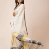 White mul cotton handloom saree with yellow and gray geometric stripes and a contrasting pallu