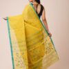 A bright yellow Handloom Jamdani Cotton saree with intricate pastel floral motifs and a contrasting turquoise blue border.
